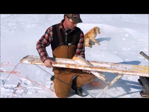 setting a gill net under the ice