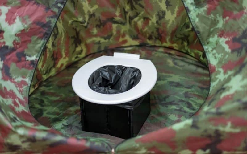 a bucket with toilet bag