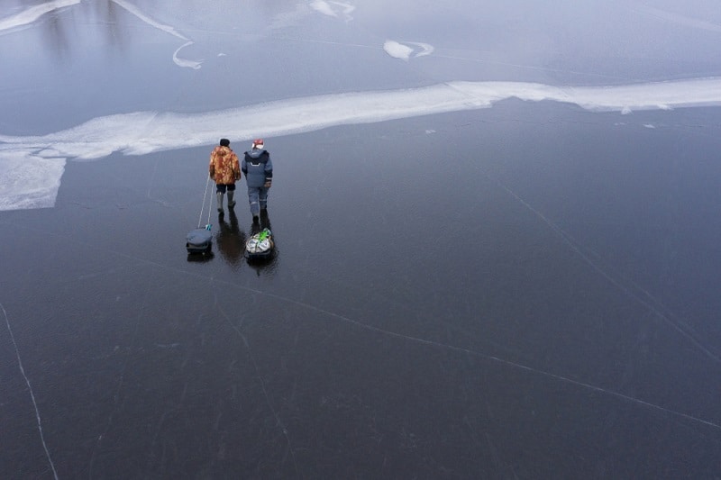 use a longer rope to pull ice fishing sleds